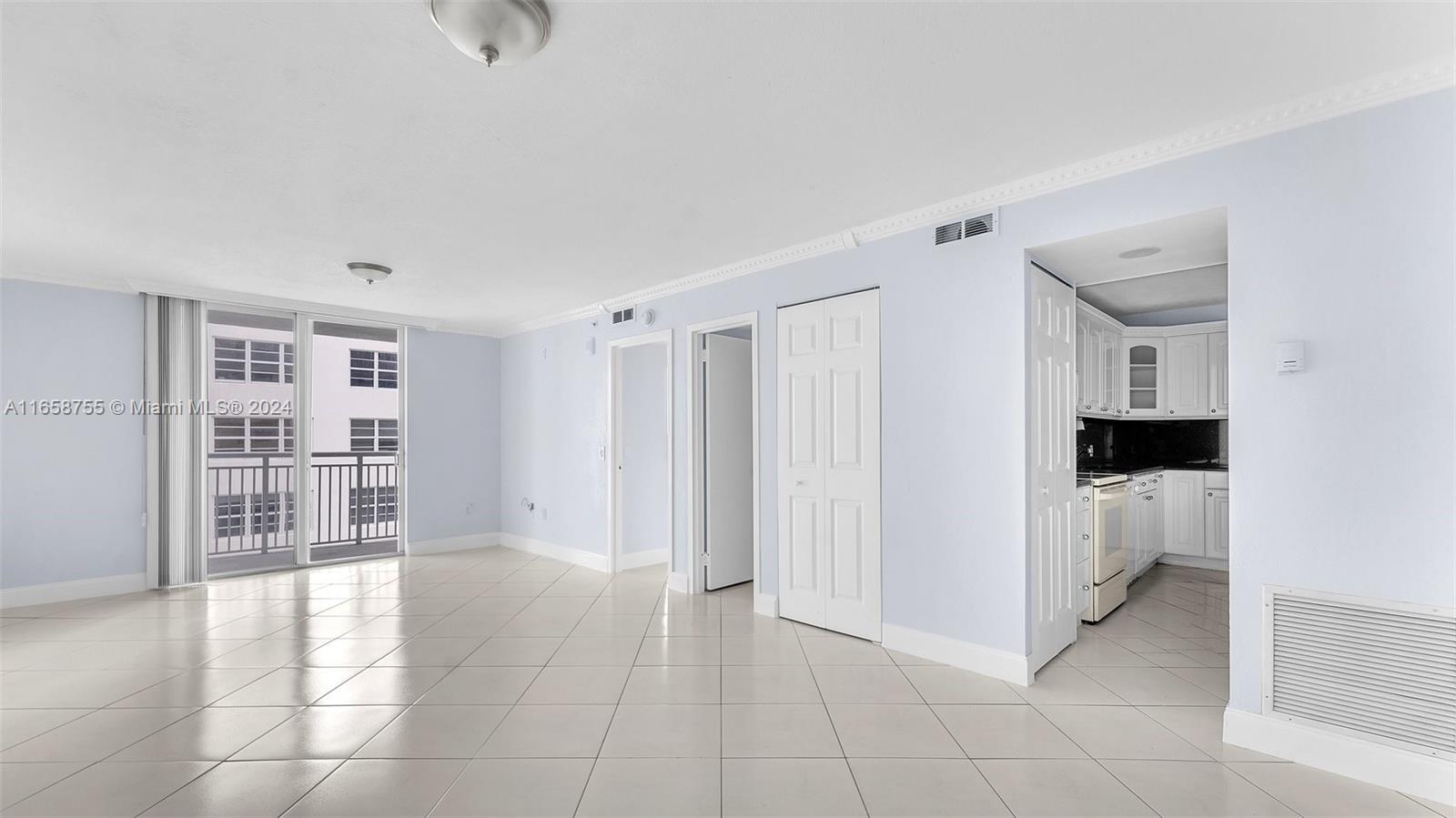 a view of livingroom with furniture and closet