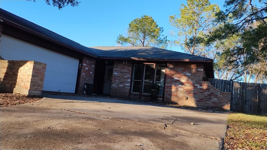 a front view of a house with a garage