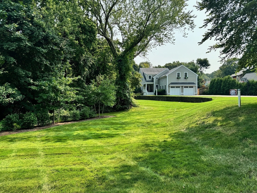 a view of a house with a big yard