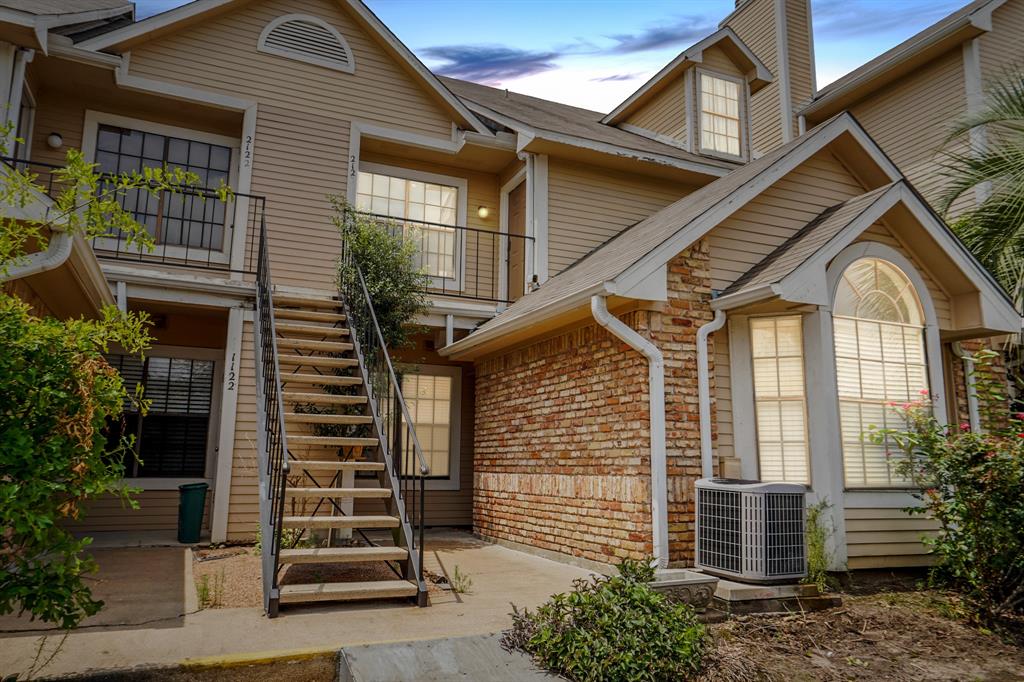 a house view with a outdoor space