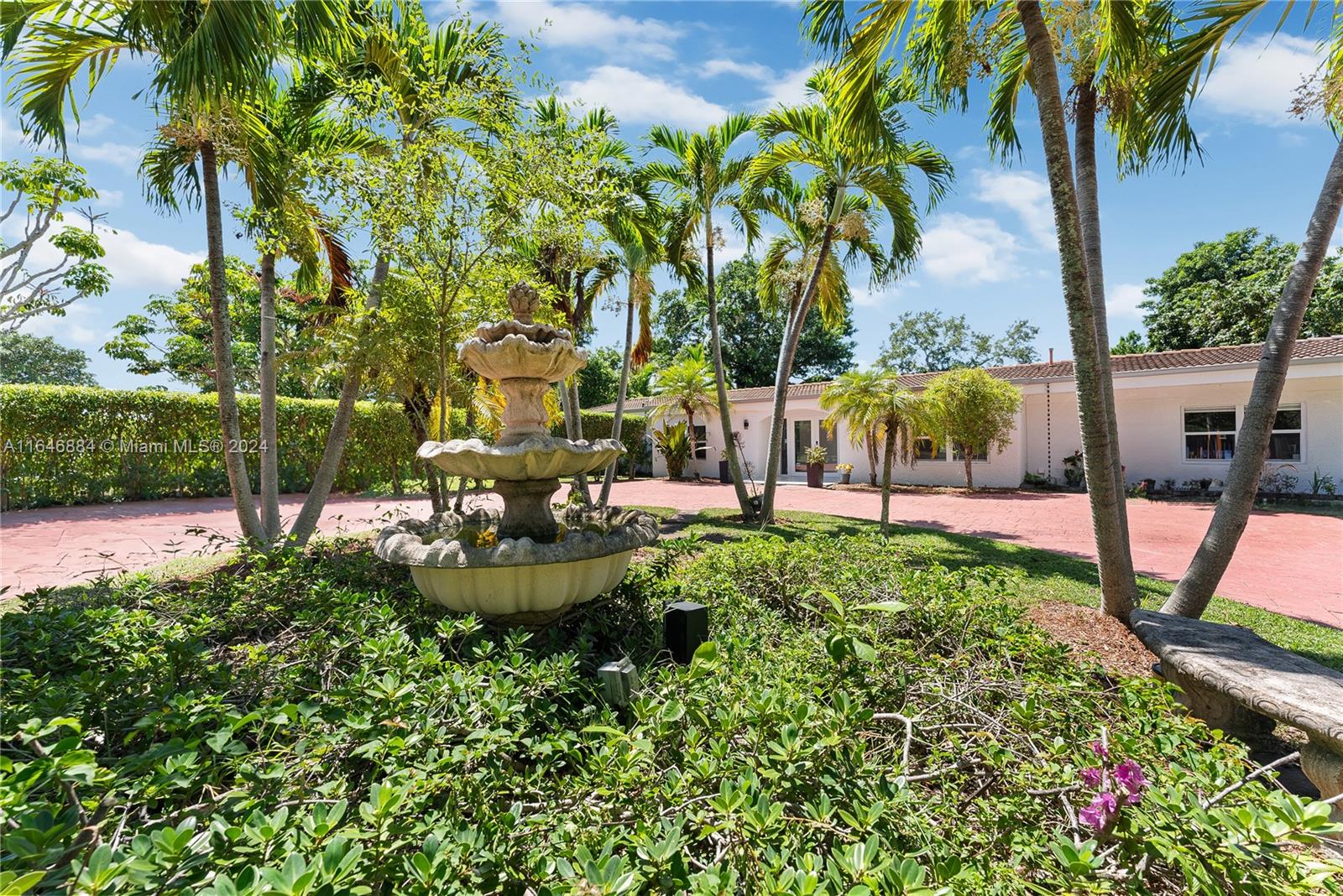 a view of a garden with a patio