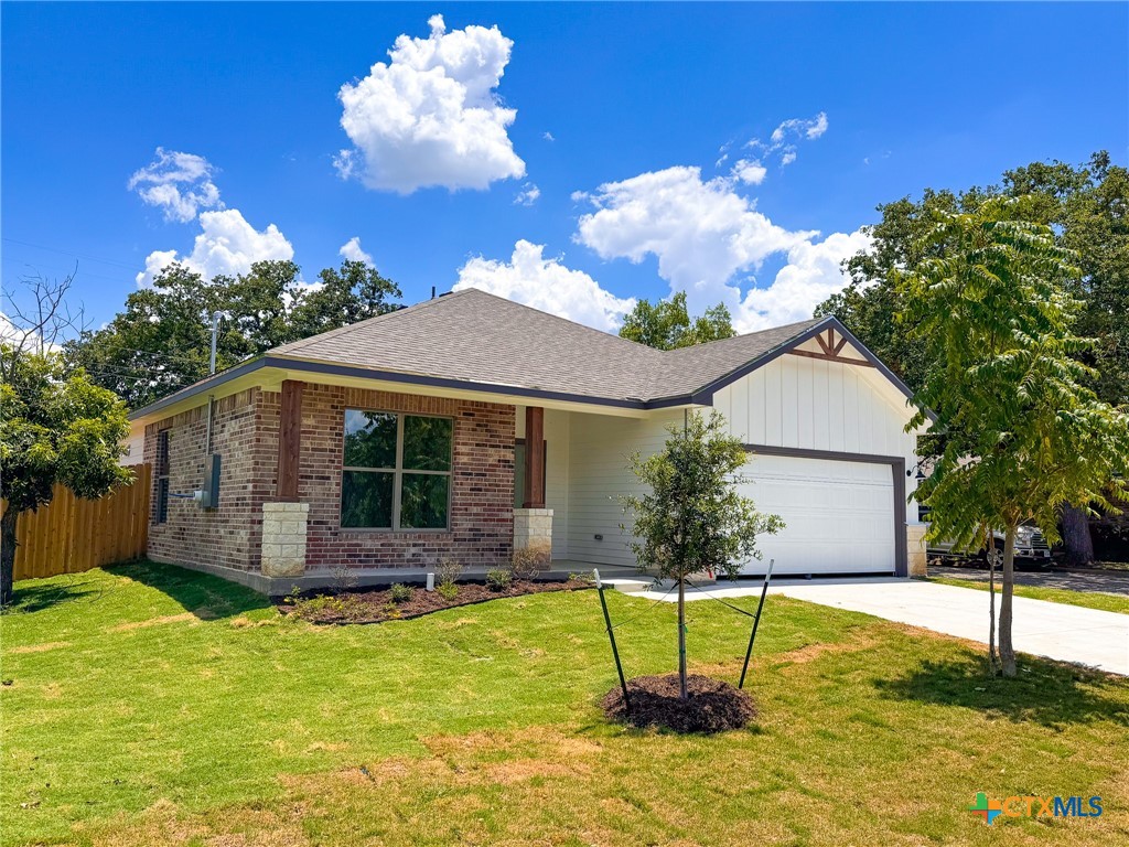 a house view with a swimming pool and a yard