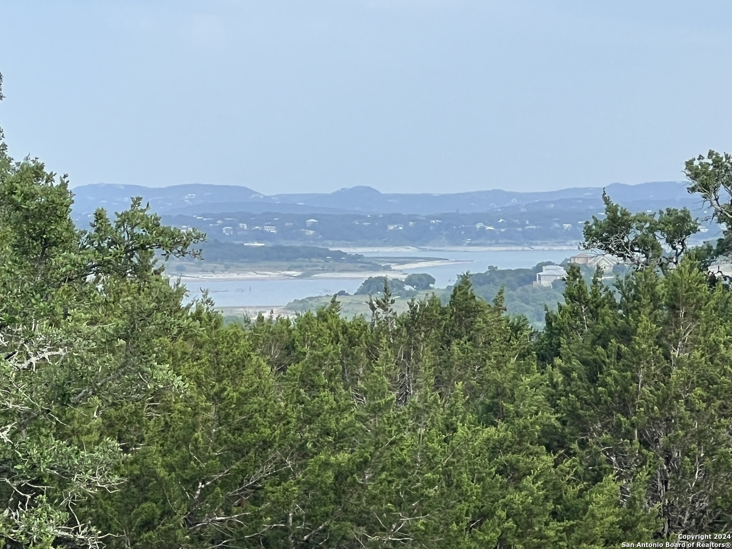 a view of lake with mountain