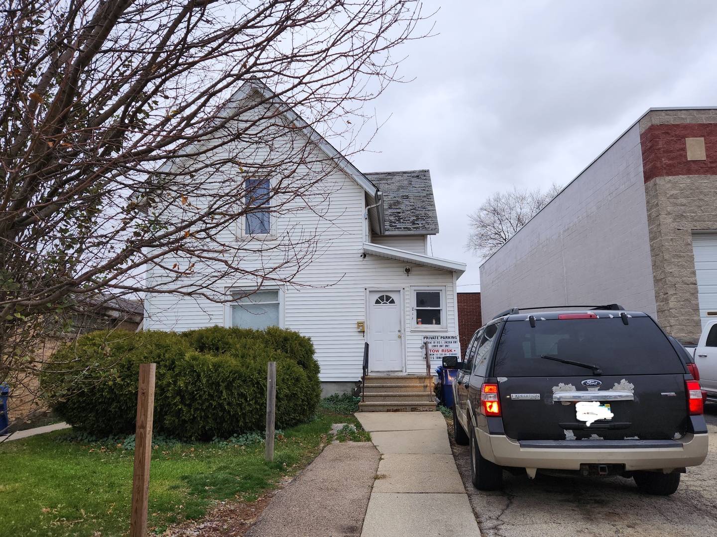 a car parked in front of a house