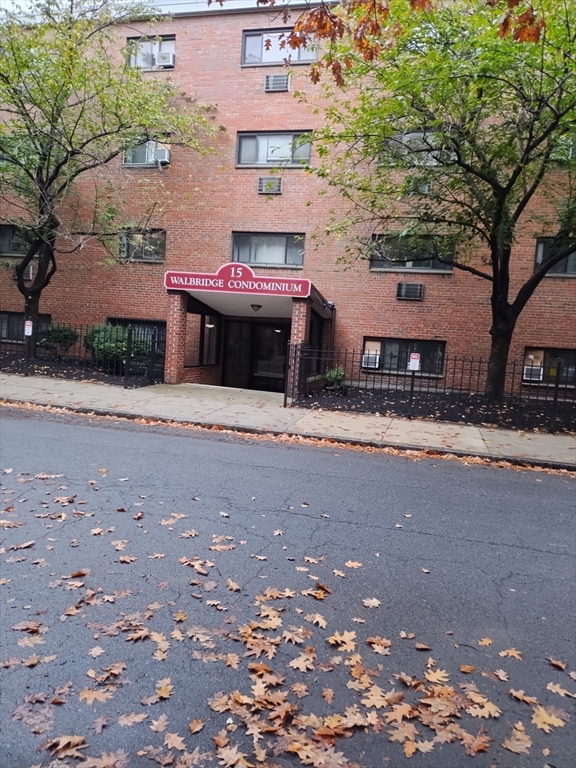 a front view of a building with street