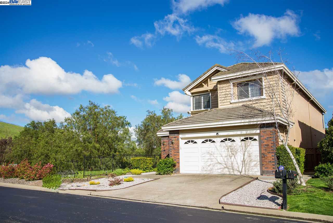 a front view of house with yard