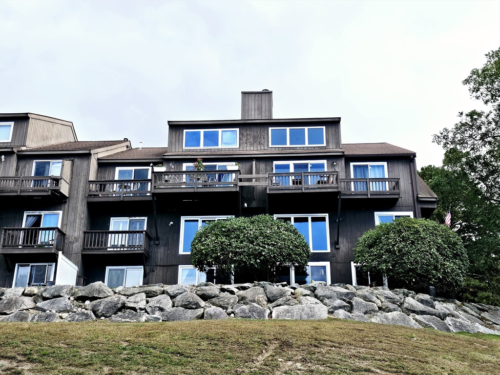 a view of pool with outdoor seating