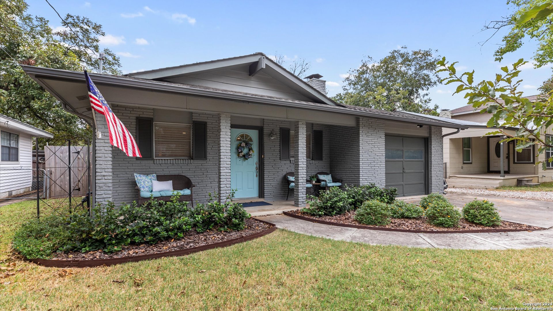 front view of a house with a yard