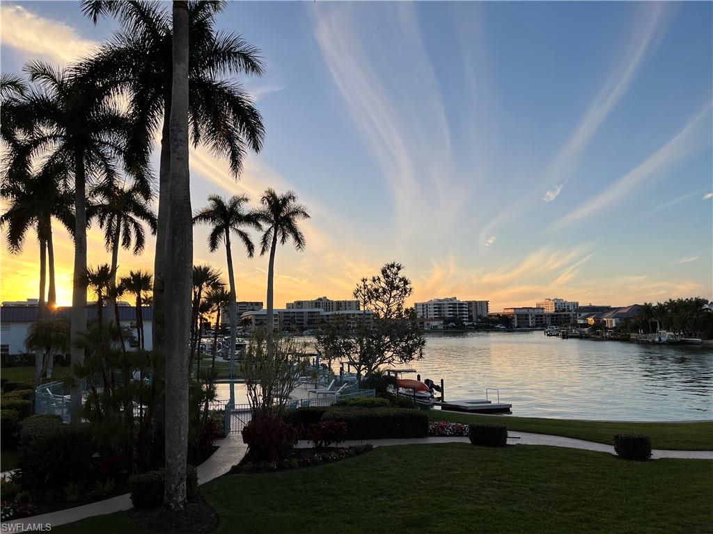 Property view of water featuring a dock