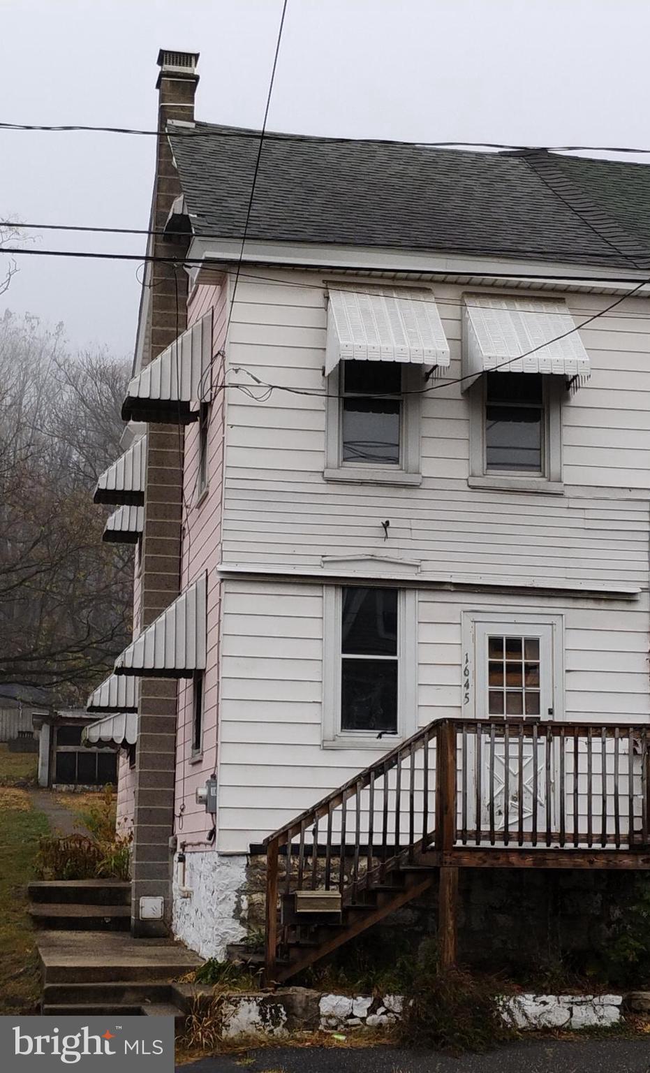 a view of a house with a balcony