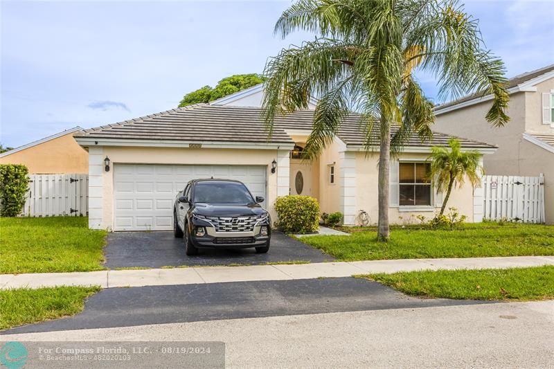 a car parked in front of a house