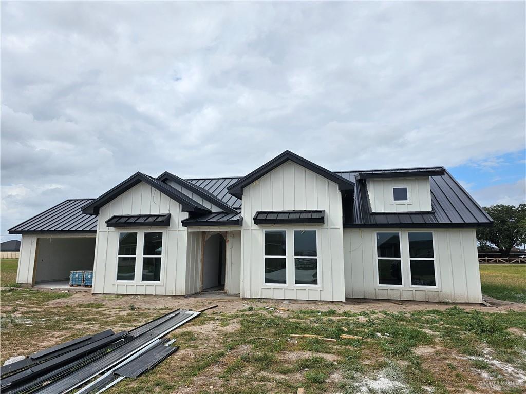 a front view of a house with yard