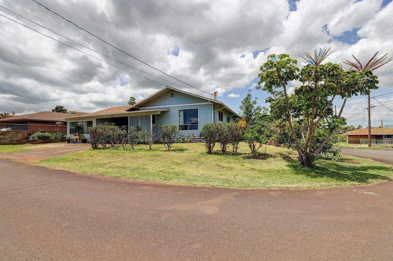 a view of house with outdoor space and street view