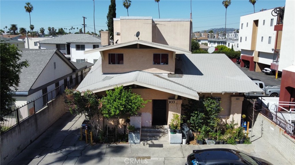 a aerial view of a house with a yard