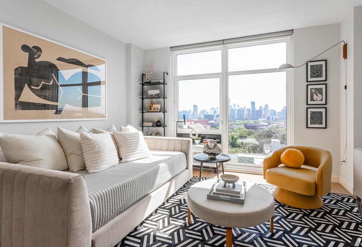 a living room with furniture and a window