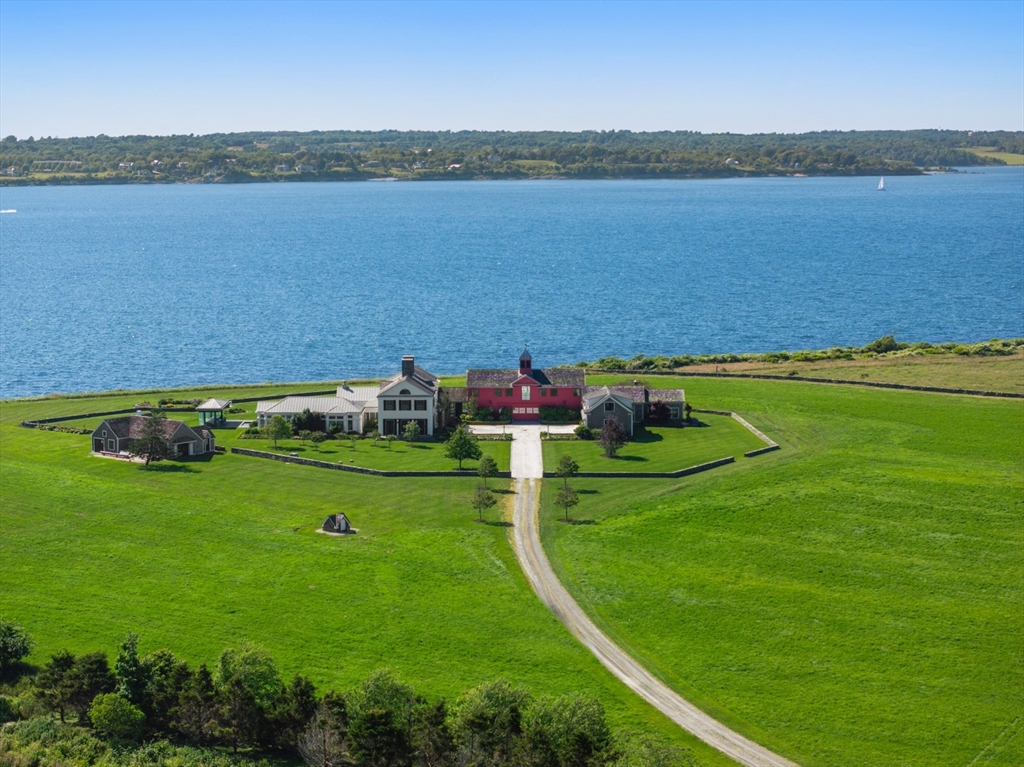 a view of a lake with a yard