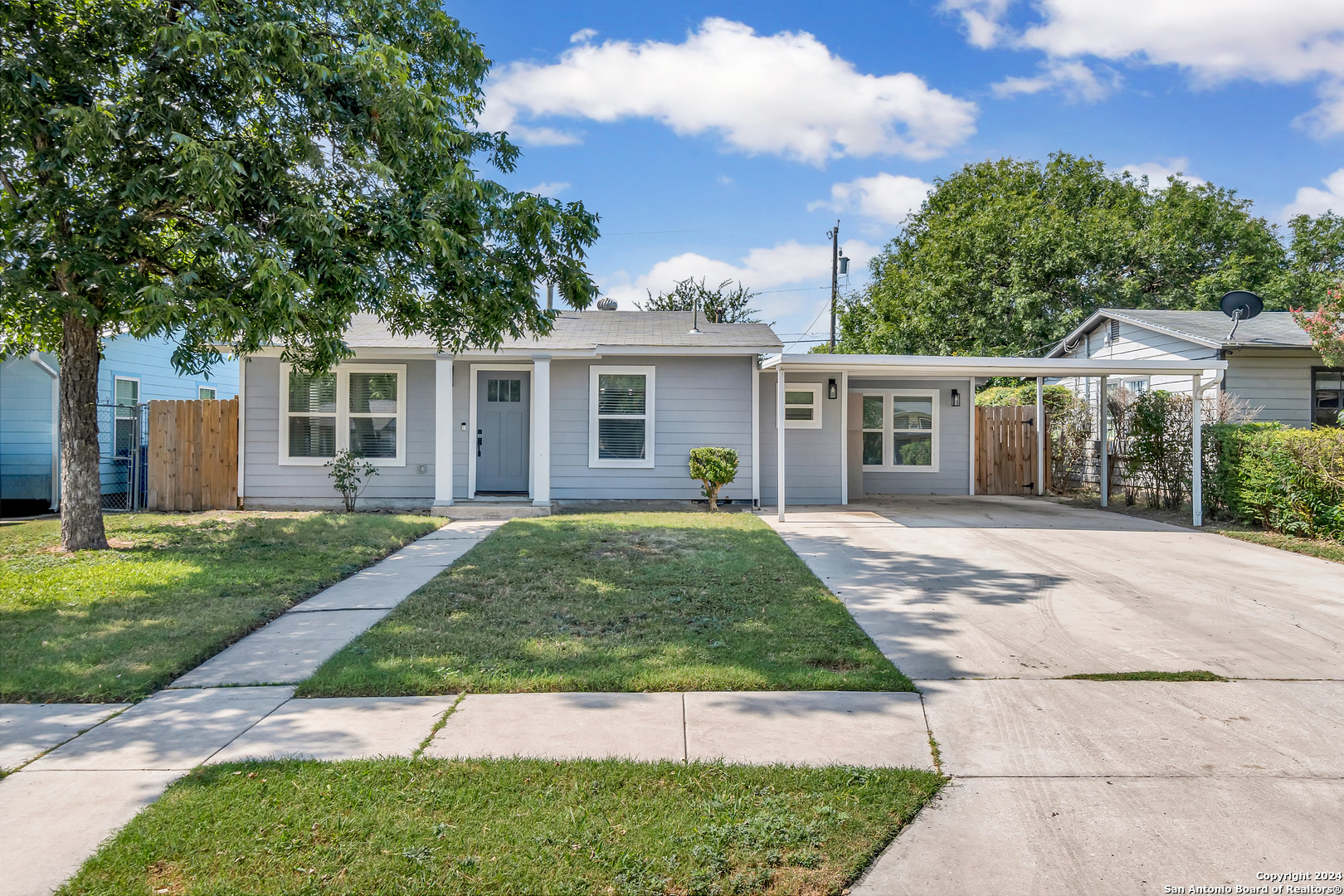 front view of a house and a yard