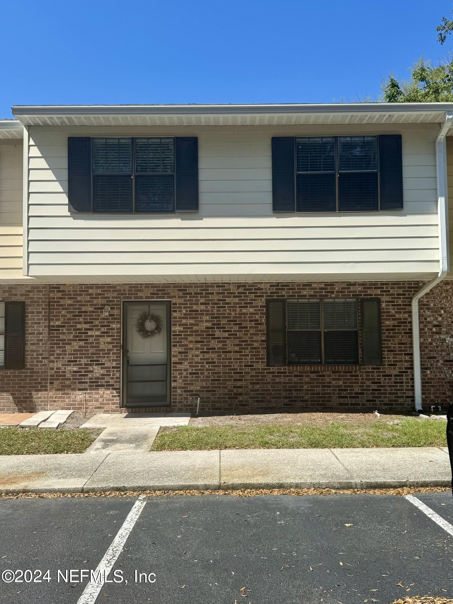 a view of a house with a garage