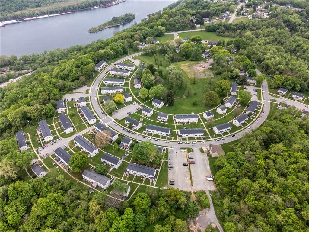 an aerial view of a house with a garden