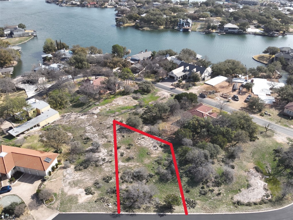 an aerial view of a houses with outdoor space