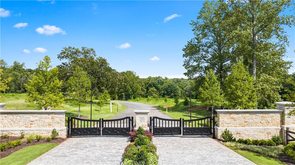 a view of a wrought iron fences in front of house