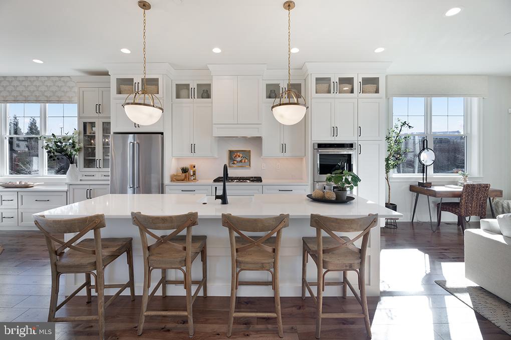 a view of a dining room and livingroom view with furniture