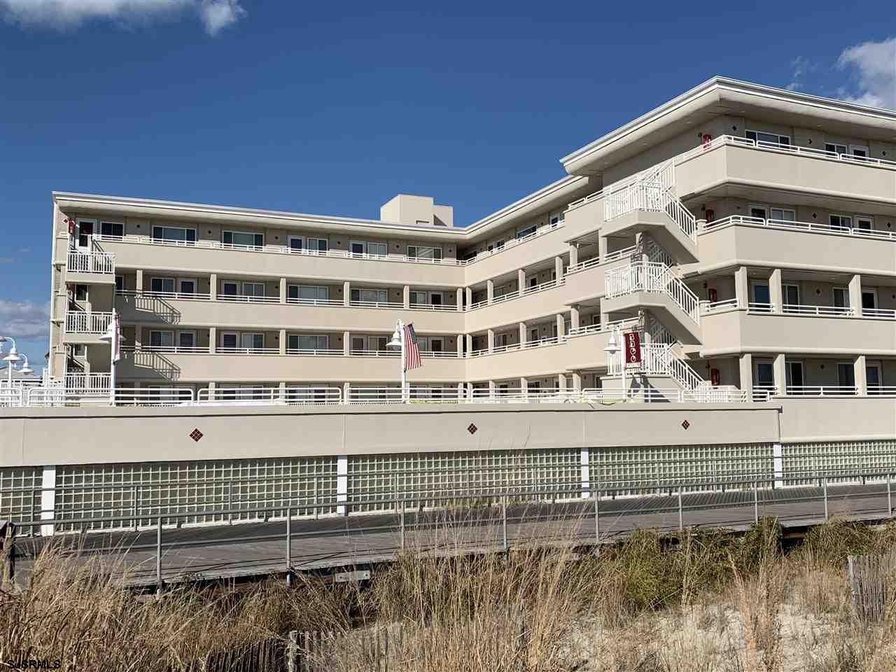 a front view of a building with glass windows