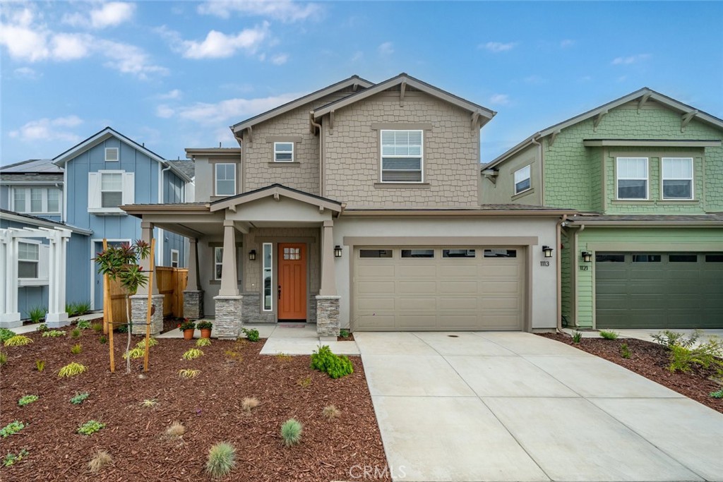 a front view of a house with yard