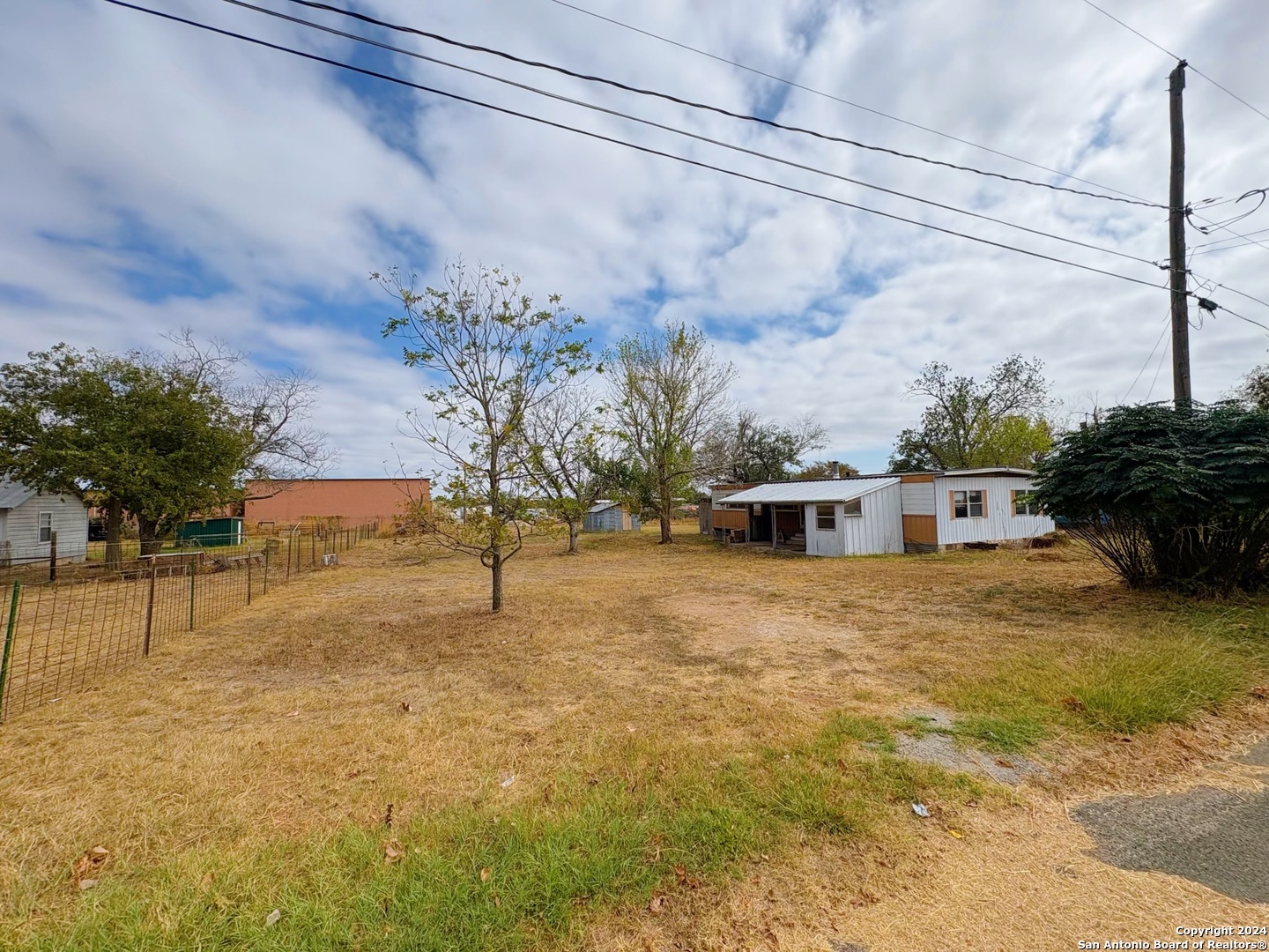 a house with trees in front of it