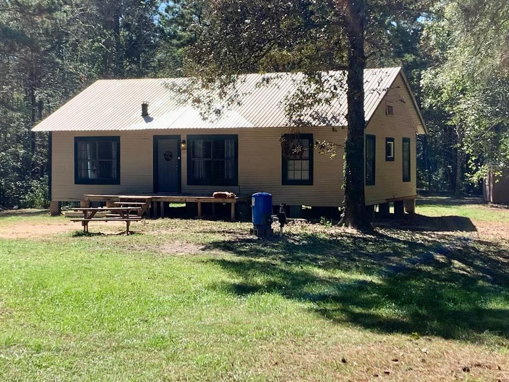 a view of backyard of a house