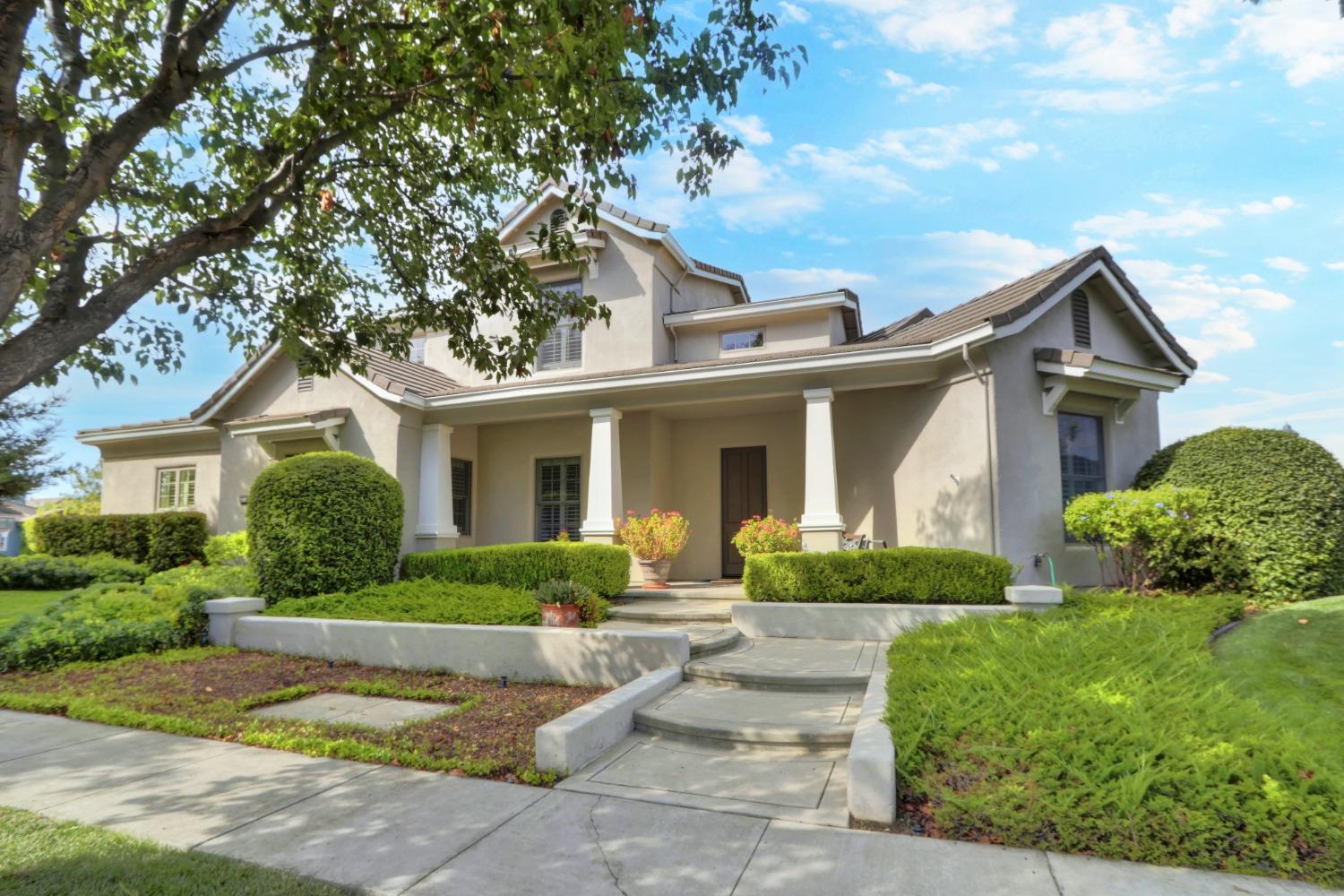 front view of a house and a yard