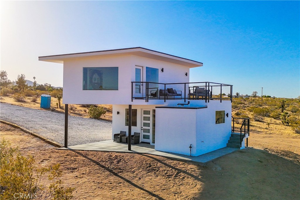 a view of a house with a patio