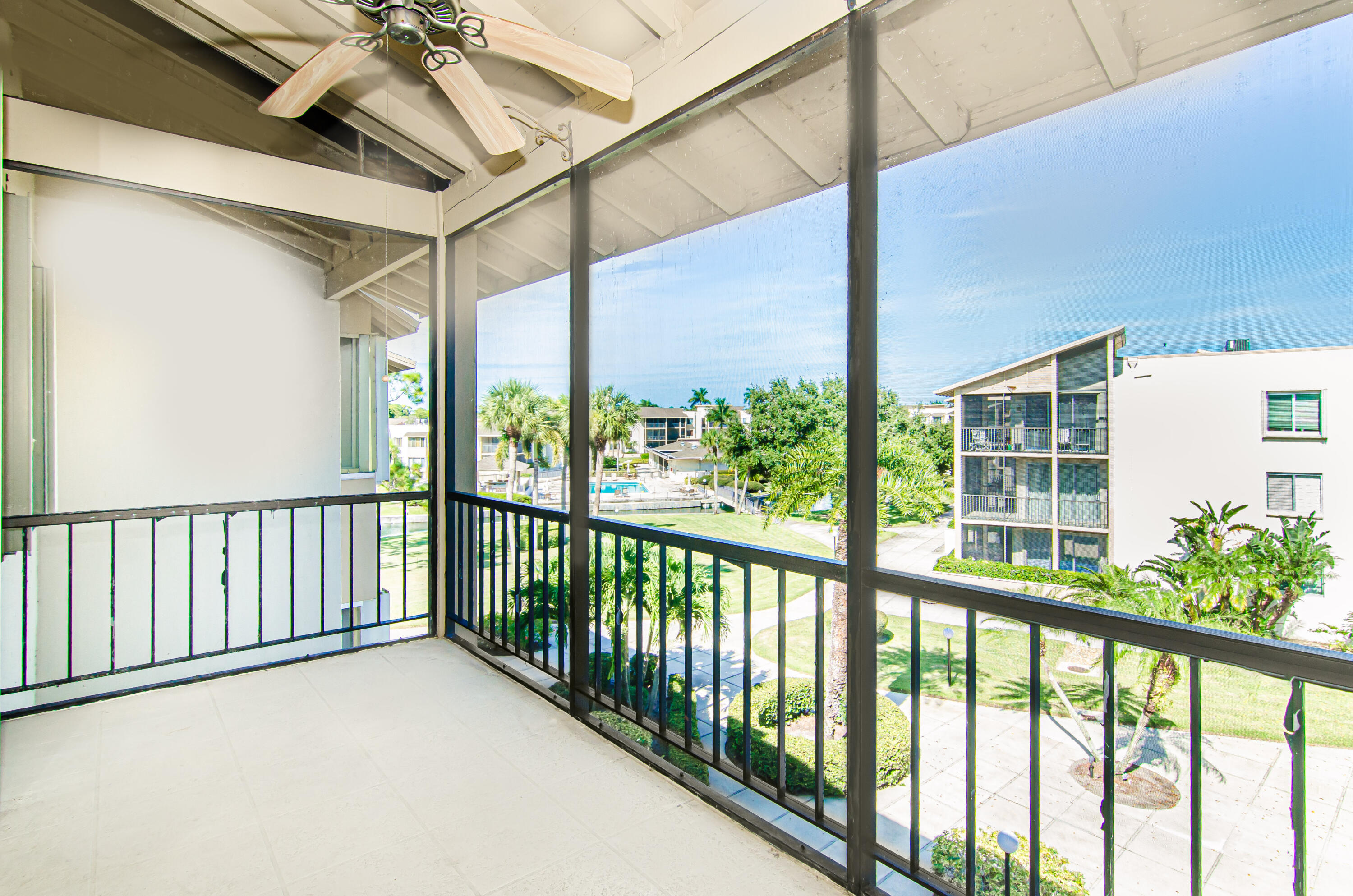 a view of balcony with furniture