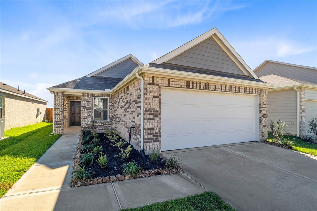 Welcome home to 22807 Wolfshire Way located in Bauer Meadows and zoned to Waller ISD!