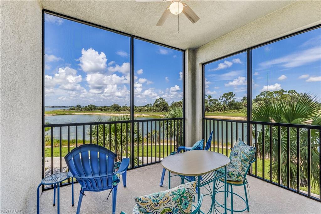 a view of a balcony with furniture