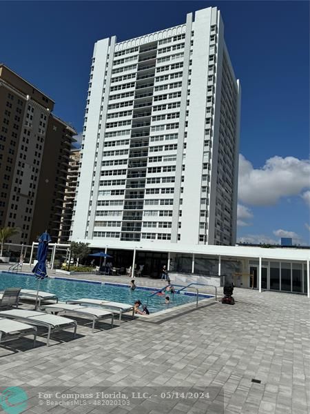 a front view of a building with glass windows