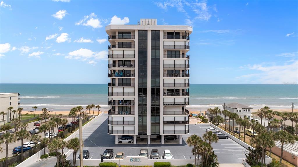 a view of ocean with a building