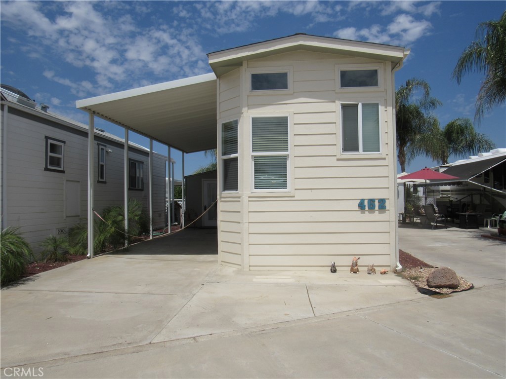 a backyard of a house with yard and garage