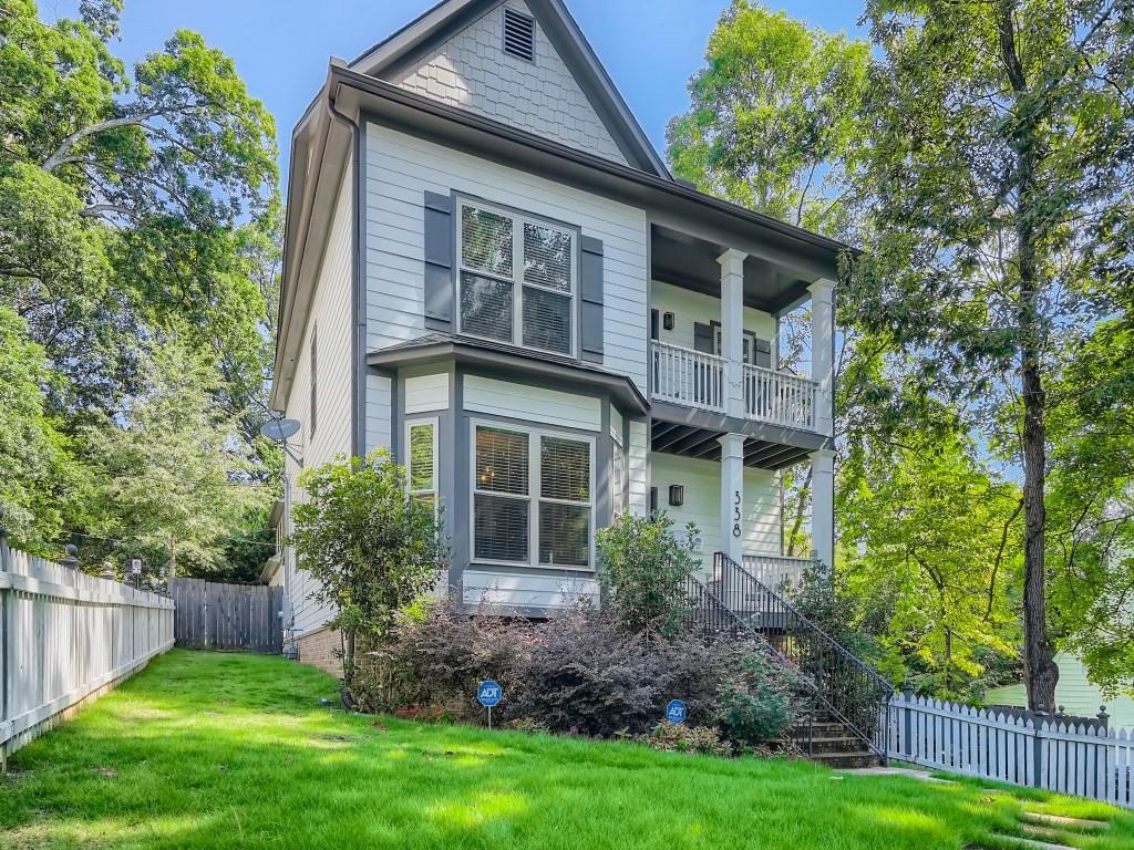 front view of a house with a yard