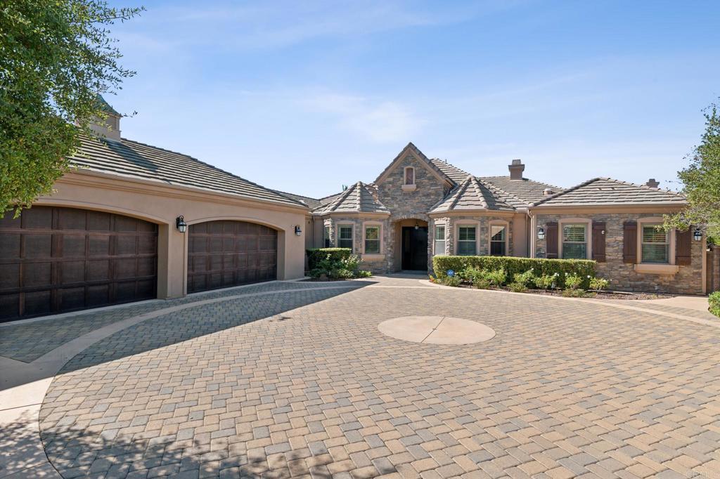 a front view of a house with yard