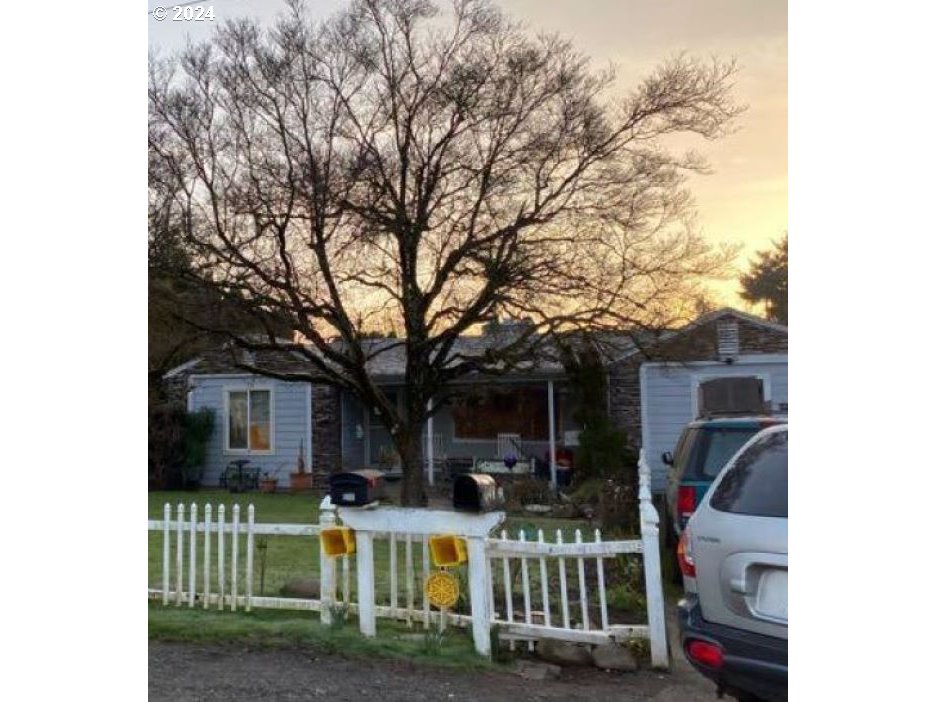 a front view of a house with a porch