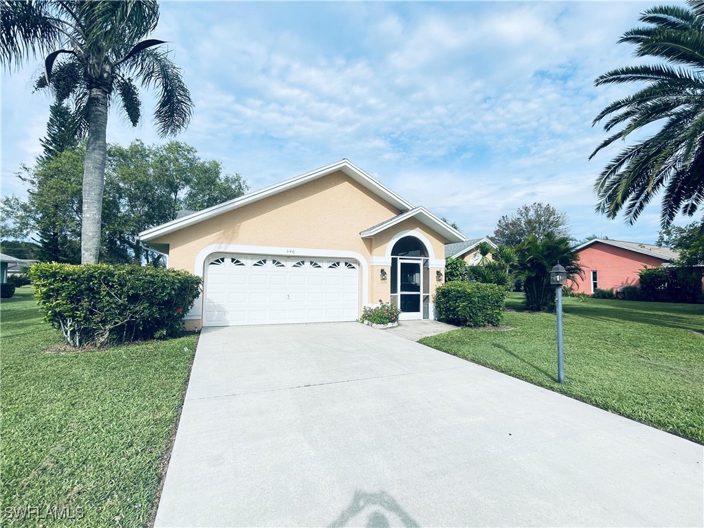 a view of front a house with a yard