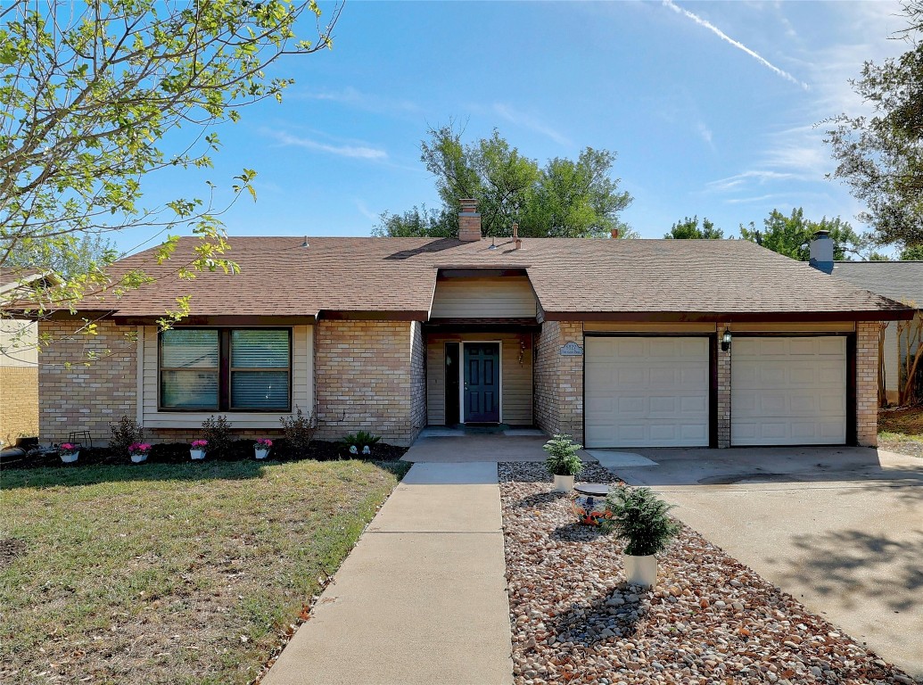 Lovely 70s era ranch with low maintenance rock landscaping