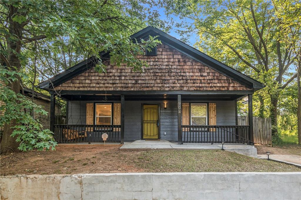 a front view of a house with garage