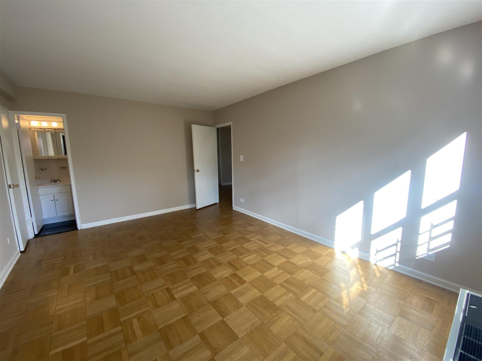 a view of an empty room and window