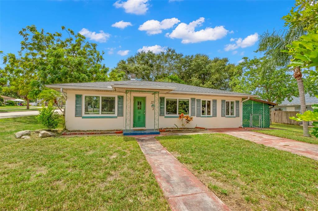 front view of a house with a yard