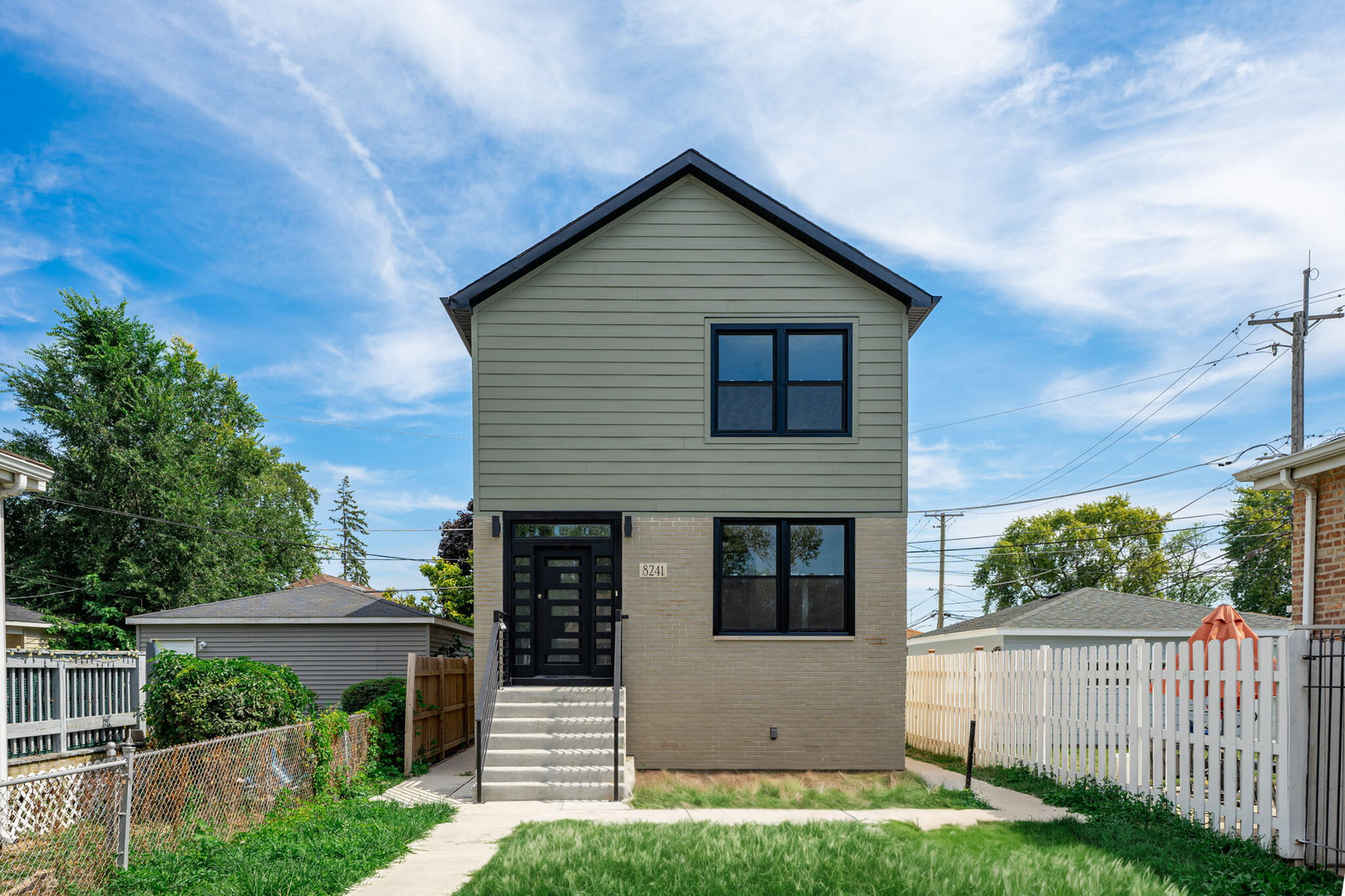 a front view of house with yard