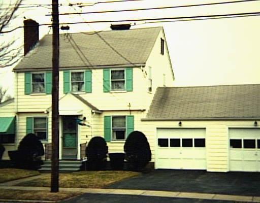 a view of a back yard of the house