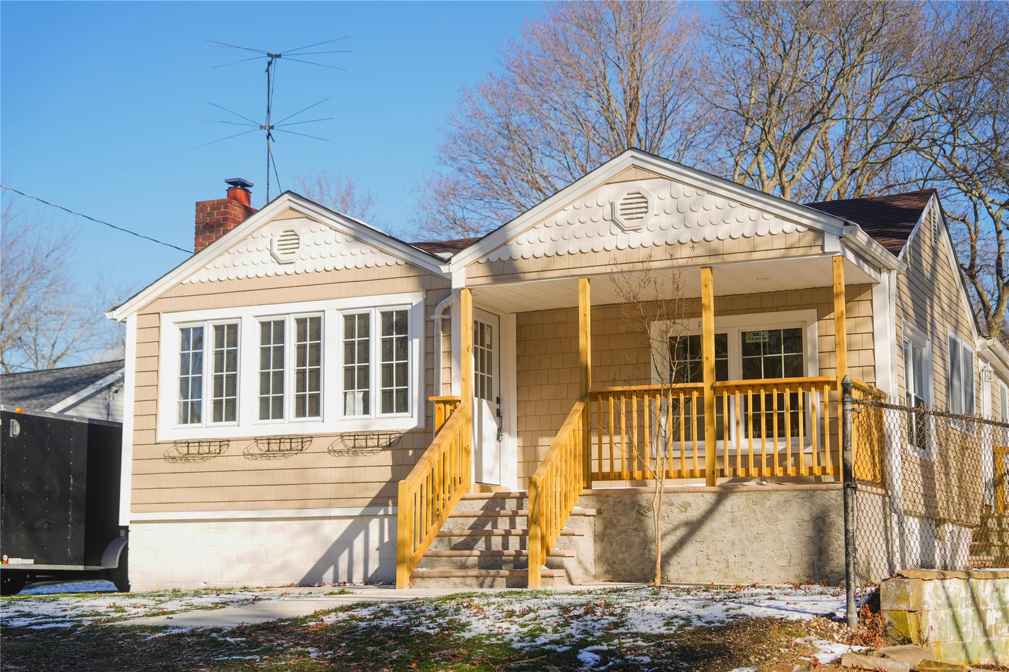 View of front of house with covered porch