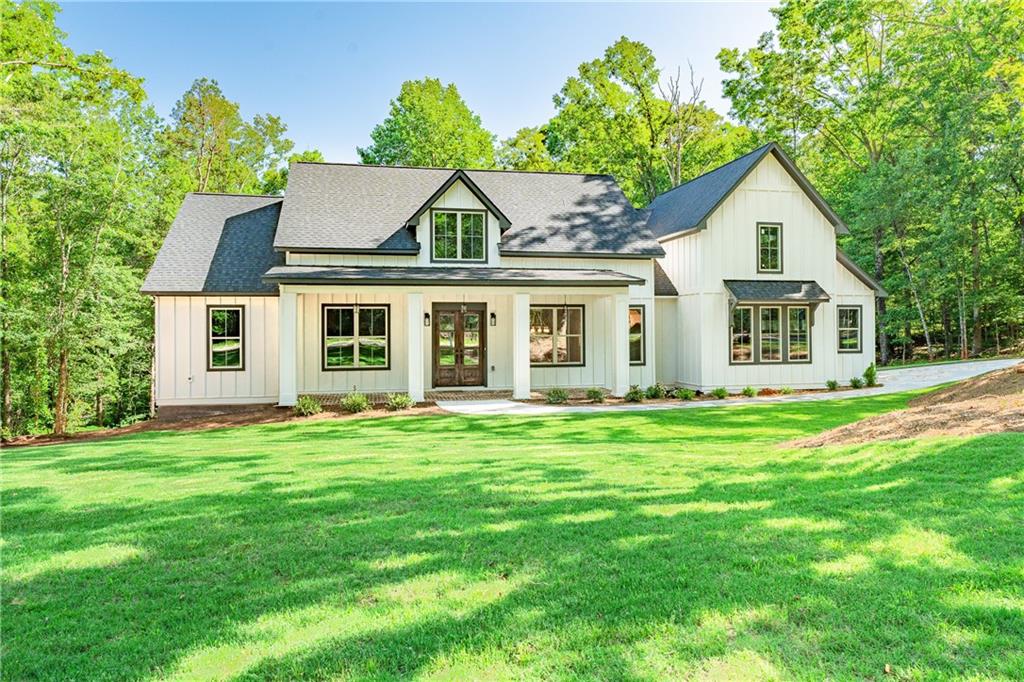 front view of a house with a yard